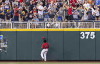 Arizona's Donta Williams (23) watches as a two-run home run hit by Vanderbilt's Jayson Gonzalez in the fourth inning during a baseball game in the College World Series, Saturday, June 19, 2021, at TD Ameritrade Park in Omaha, Neb. (AP Photo/Rebecca S. Gratz)