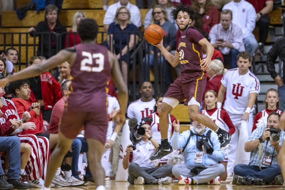 Bethune-Cookman guard Joe French (30) saves the ball from going out of bounds during the first half of the team's NCAA college basketball game against Indiana, Thursday, Nov. 10, 2022, in Bloomington, Ind. (AP Photo/Doug McSchooler)