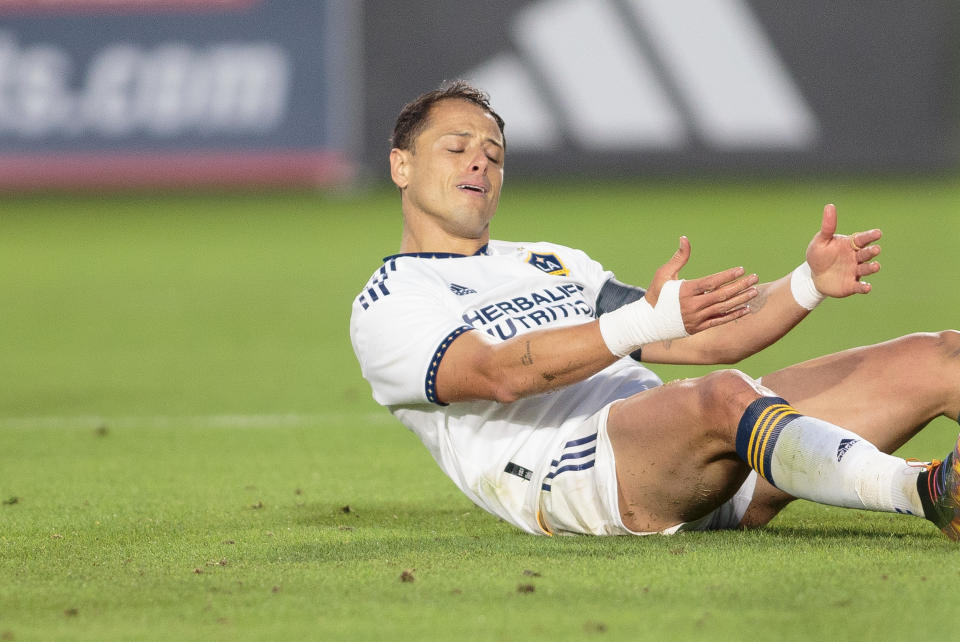 CARSON, CA - MAY 27: Javier Hernandez #14 of the Los Angeles Galaxy is knocked down during a regular season game between Charlotte FC and the Los Angeles Galaxy at Dignity Health Sports Park on May 27, 2023 in Carson, California.  (Photo by Michael Janosz/ISI Photos/Getty Images)