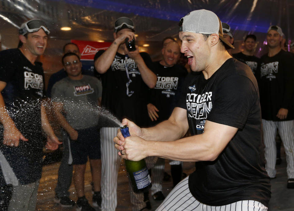 NEW YORK, NEW YORK - SEPTEMBER 19:  Tommy Kahnle #48 of the New York Yankees celebrates after the New York Yankees clinched the Americal League Division title with the 9-1 win over the Los Angeles Angels at Yankee Stadium on September 19, 2019 in Bronx borough of New York City. (Photo by Elsa/Getty Images)