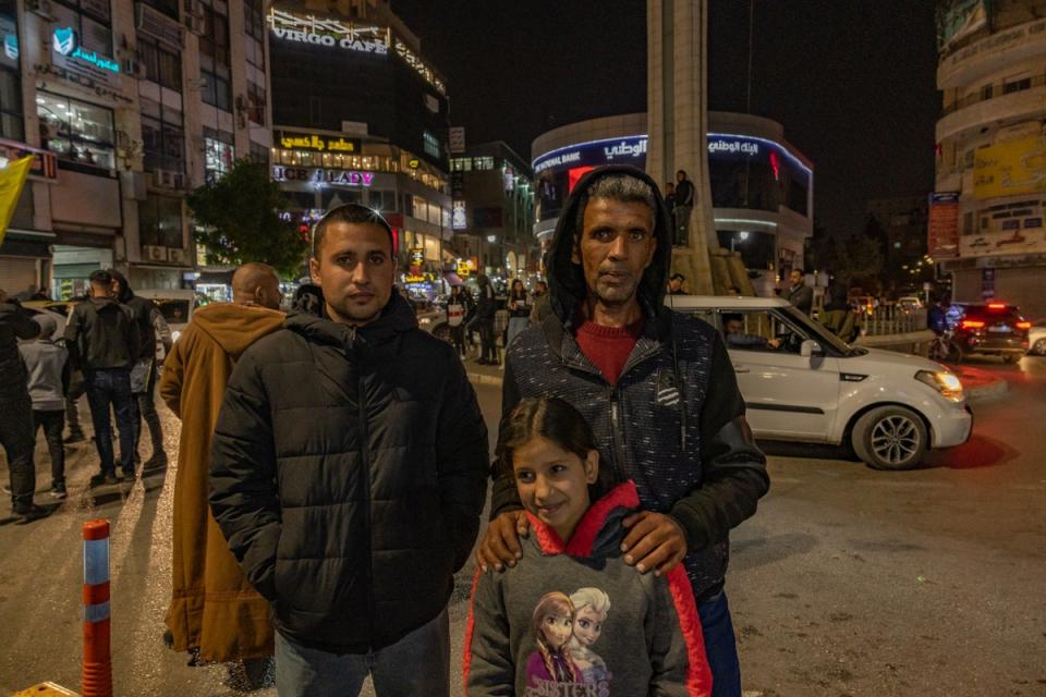 Obada's family waiting anxiously by a main roundabout in Ramallah for him to be released from prison (Bel Trew)