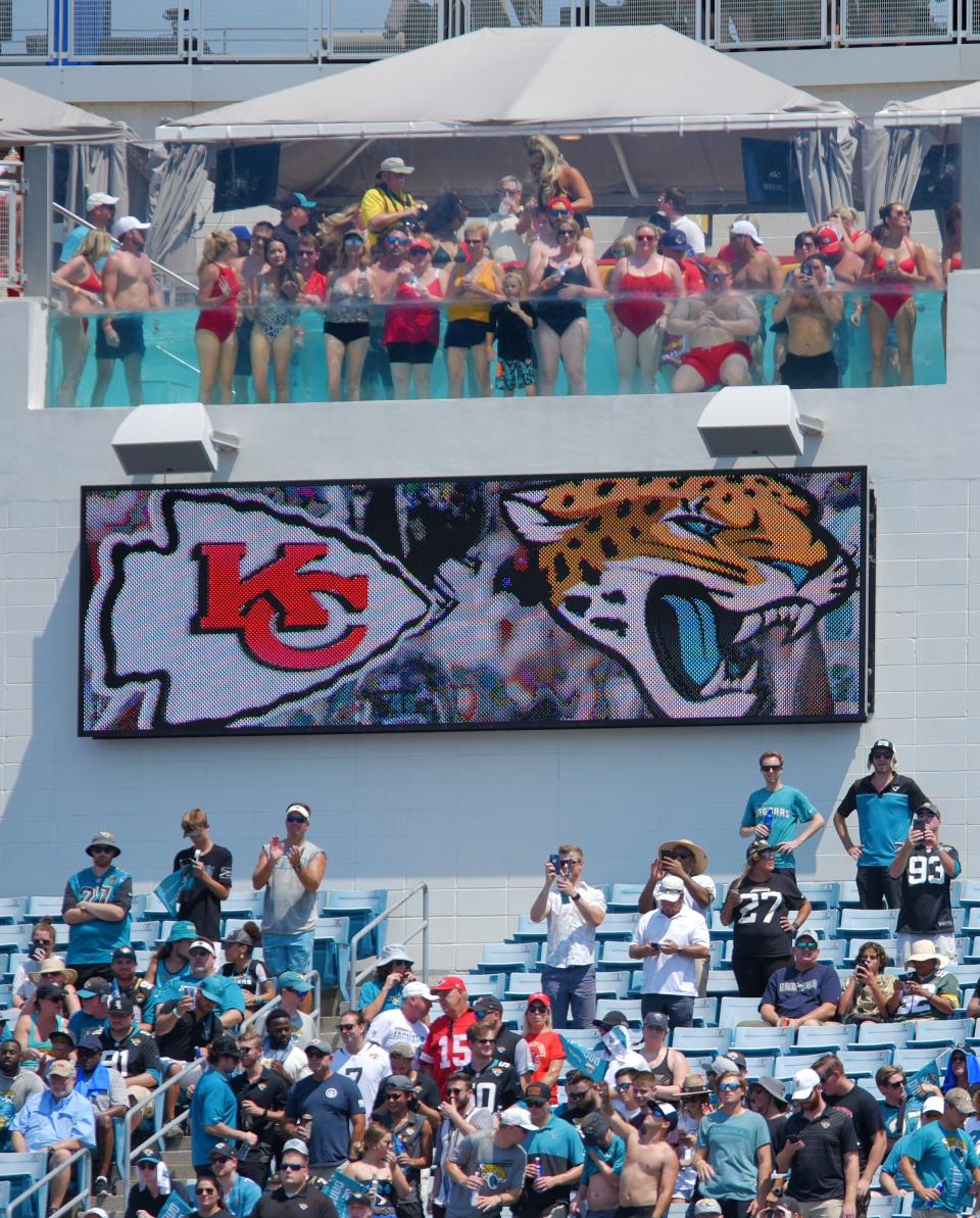 Jaguars fans at the 2019 home opener against Kansas City take advange of the stadium pools to keep cool in 90-degree heat.
