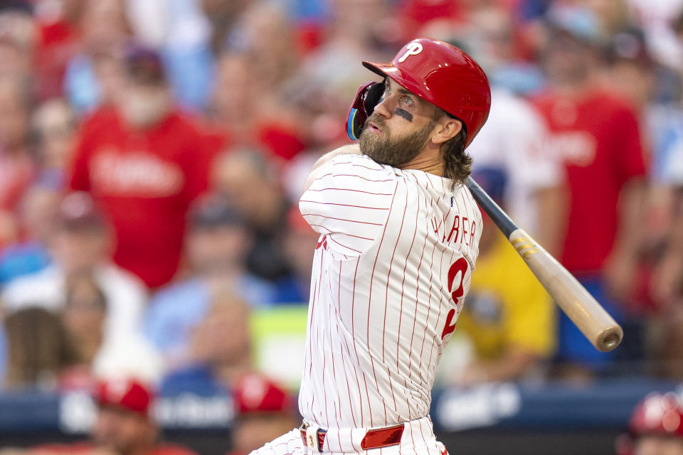 FILE - Philadelphia Phillies' Bryce Harper bats during a baseball game against the Milwaukee Brewers, Monday, June 3, 2024, in Philadelphia.The Phillies have reinstated first baseman Bryce Harper and designated hitter Kyle Schwarber from the 10-day injured list and could have both key players as they face the Los Angeles Dodgers in a matchup of division leaders. (AP Photo/Chris Szagola, Filer)