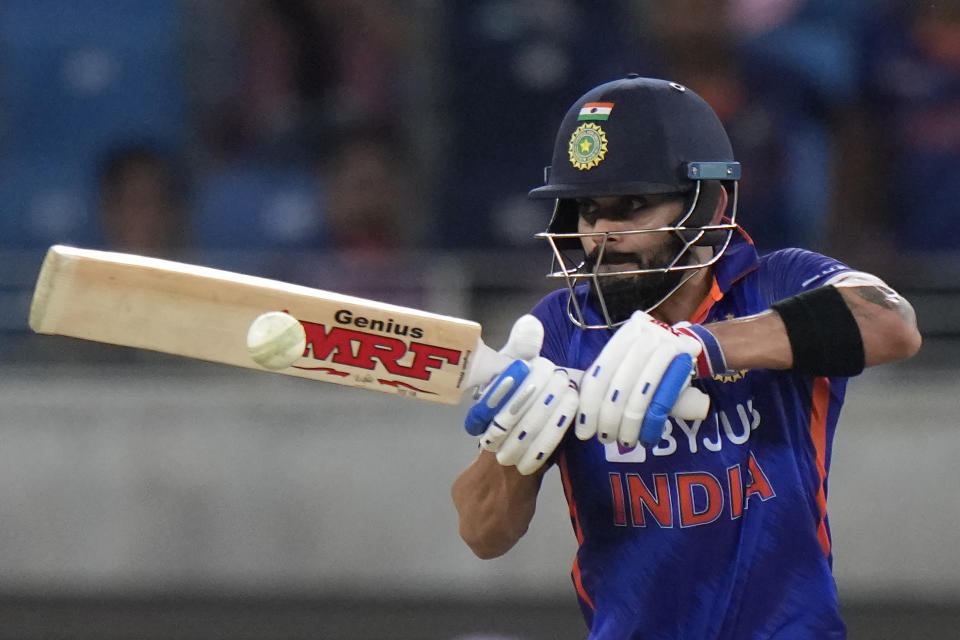 India's Virat Kohli plays a shot during the T20 cricket match of Asia Cup between India and Afghanistan, in Dubai, United Arab Emirates, Thursday, Sept. 8, 2022. (AP Photo/Anjum Naveed)