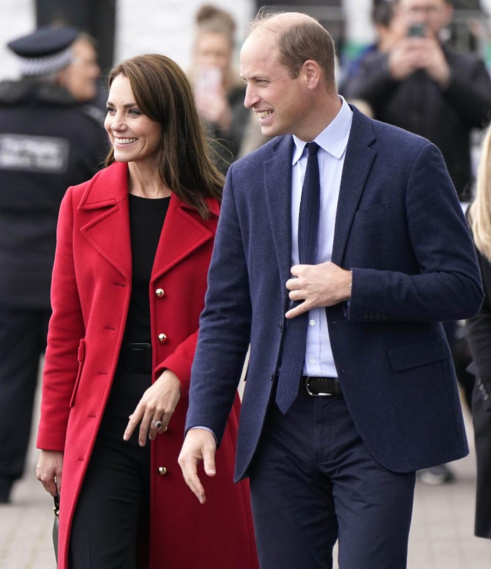 The Prince and Princess of Wales smile to members of the public during a visit to Holyhead Marine Cafe and Bar in Holyhead, Wales, where they are meeting representatives of small businesses and organisations, including the Coastguard and Sea Cadets