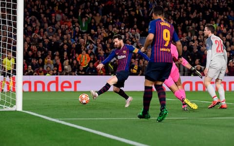 Messi taps in the second - Credit: LLUIS GENE/AFP/Getty Images