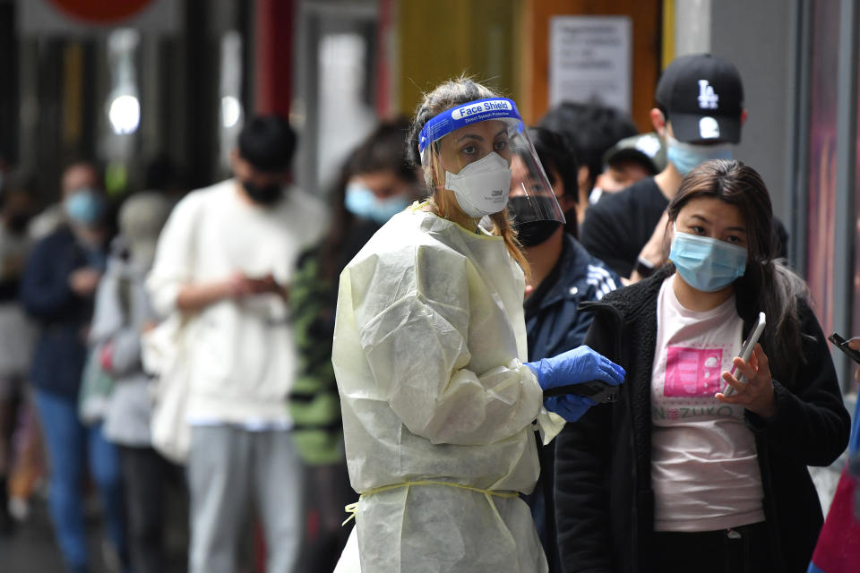 People queue at a walk-in Covid-19 testing site at in Melbourne on Wednesday. Source: AAP