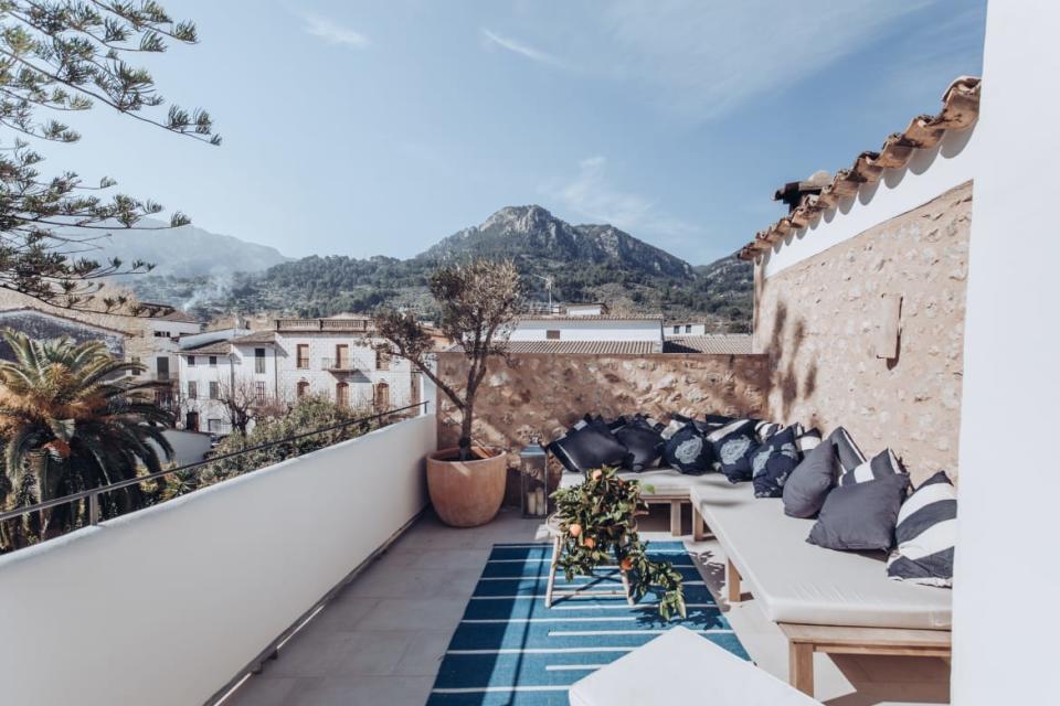 <div class="inline-image__caption"><p>The rooftop terrace combines all the best of the Mediterranean—lounge chairs so you can happy hour in comfort, olive trees for a little ambiance, and views of the Tramuntana mountains which just so happen to be a UNESCO world heritage site. </p></div> <div class="inline-image__credit">Bjurfors</div>