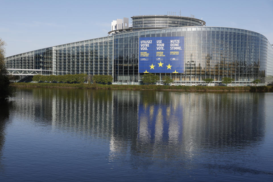 A giant canvas promoting the European elections is seen on the European Parliament Thursday, April 11, 2024 in Strasbourg, eastern France. The European Elections will take place from June 6 to June 9 2024. (AP Photo/Jean-Francois Badias)