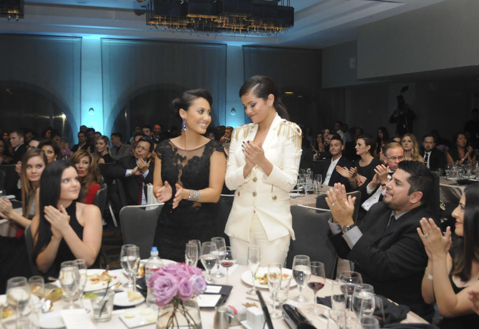 LOS ANGELES, CA - NOVEMBER 08: (EXCLUSIVE COVERAGE)  Actress Francia Raisa, actress / singer Selena Gomez and Ricardo Joel Gomez attend the Unlikely Heroes' 3rd Annual Awards Dinner And Gala at Sofitel Hotel on November 8, 2014 in Los Angeles, California.  (Photo by Vivien Killilea/Getty Images for Unlikely Heroes)