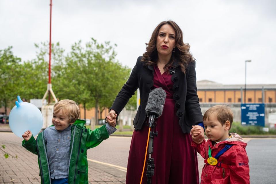 Stella Moris stands with her children Gabriel and Max as she speaks to the media outside Belmarsh Prison in 2021 (Dominic Lipinski/PA) (PA Wire)