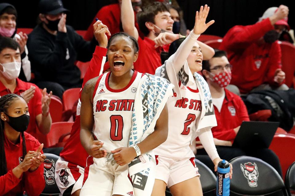 Diamond Johnson (0) starts to celebrate with teammate Raina Perez (2) in the closing minutes of the second half of an NCAA college basketball game against Duke, Sunday, Jan. 16, 2022, in Raleigh, N.C. (AP Photo/Karl B. DeBlaker)