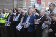 People gather during a vigil for murdered journalist 29 year-old Lyra McKee, in Dublin, Ireland, Tuesday April 23, 2019. McKee was shot dead April 18, while reporting on rioting in Londonderry, Northern Ireland, and an Irish Republican Army (IRA) splinter group has admitted responsibility and apologised for the killing. (Niall Carson/PA via AP)