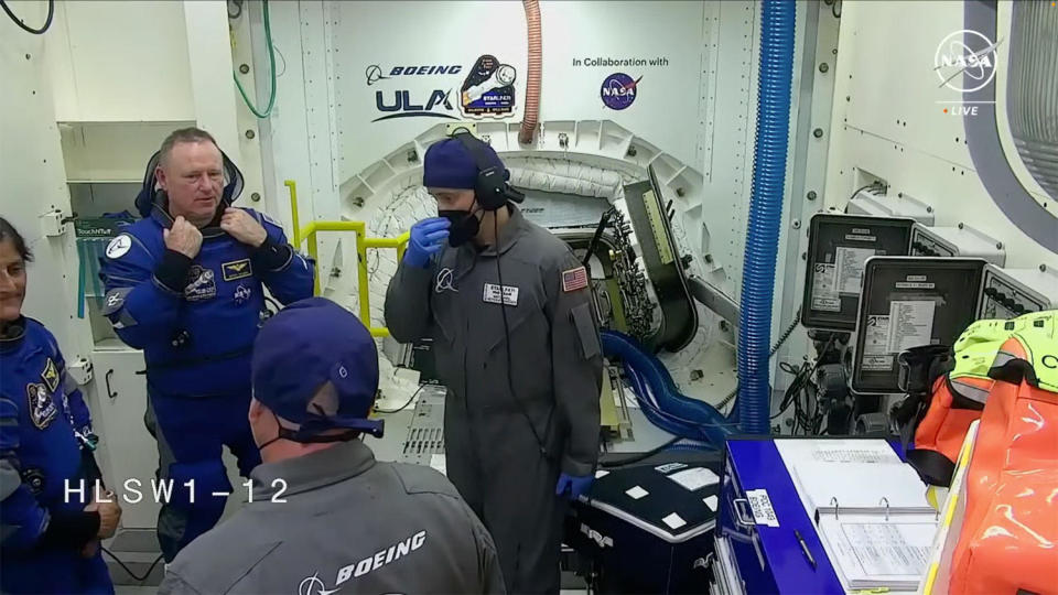Sunita Williams, left, and commander Butch Wilmore climbed out of the Starliner capsule shortly after launch was scrubbed and were driven back to crew quarters at the Kennedy Space Center to relax and await word on when they might be cleared to make another launch try. / Credit: NASA TV