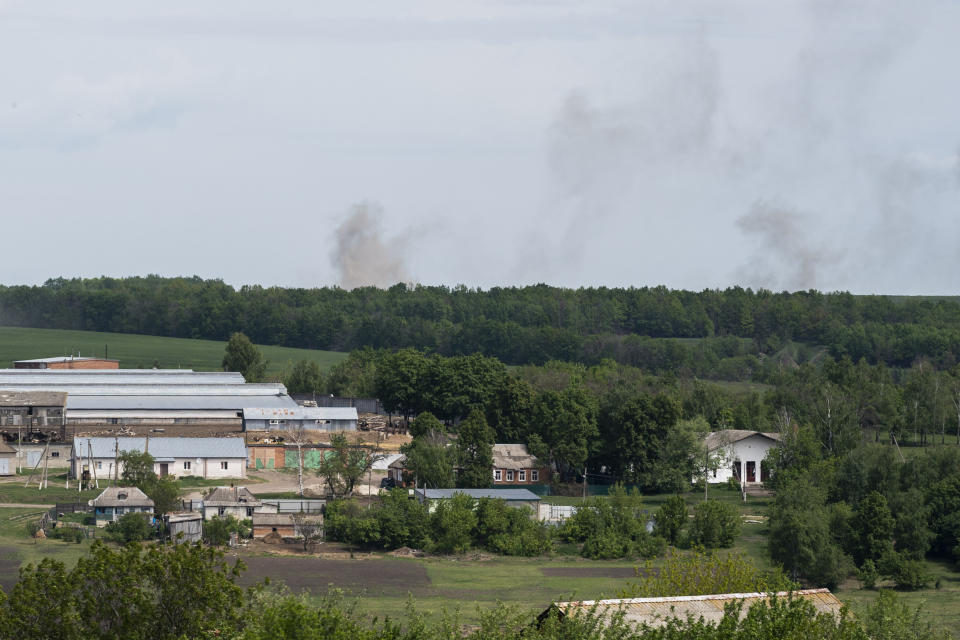 Smoke rises during shelling near Shestakove, east of Kharkiv, Ukraine, Wednesday, May 25, 2022. (AP Photo/Bernat Armangue)