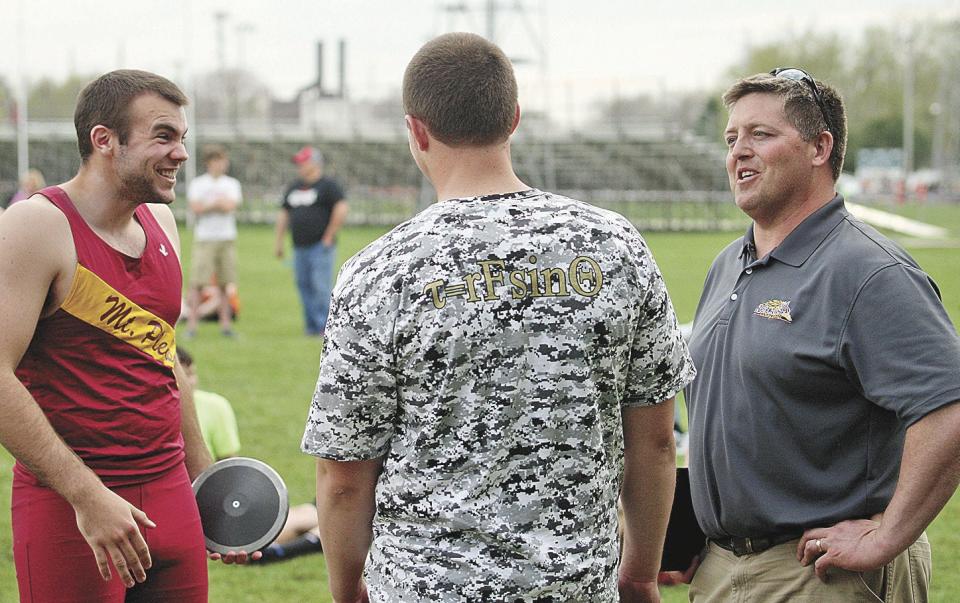 Mount Pleasant High School football coach Shawn Striegel (right) tendered his resignation Tuesday.