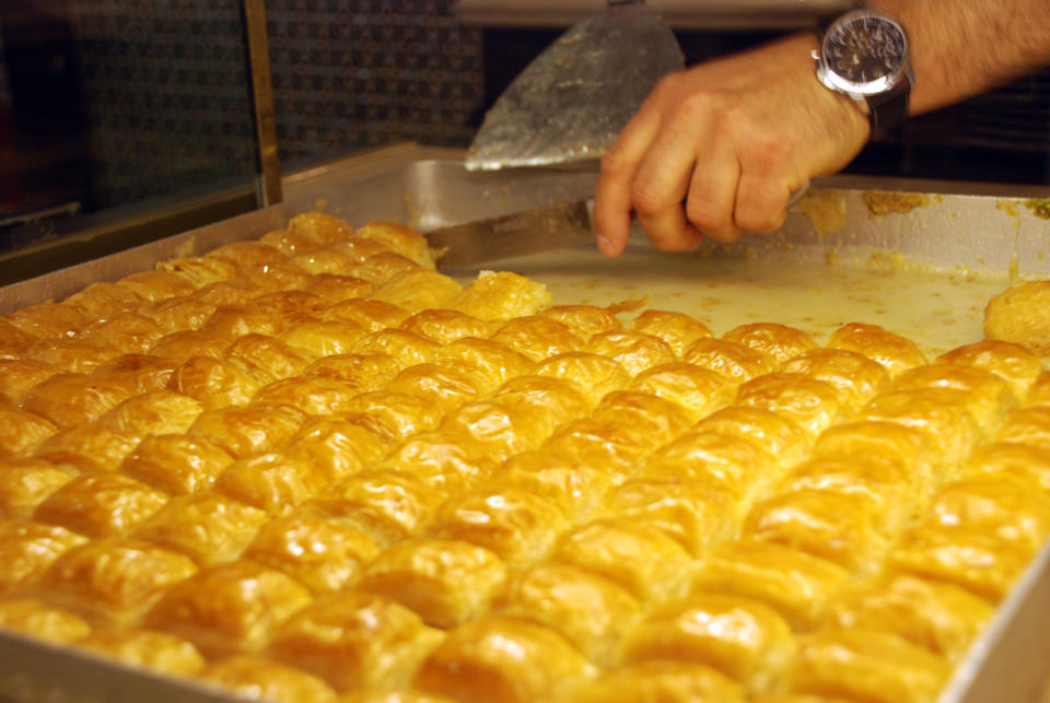 This undated photo shows sutlu Nuriye, a puffier, creamier version of baklava, in a shop in the neighborhood of Karakoy in Istanbul, Turkey. Istanbul is best-known among tourists for mosques and bazaars but it also offers interesting neighborhoods to explore like Karakoy, home to small shops, galleries and cafes. (AP Photo/Sisi Tang)