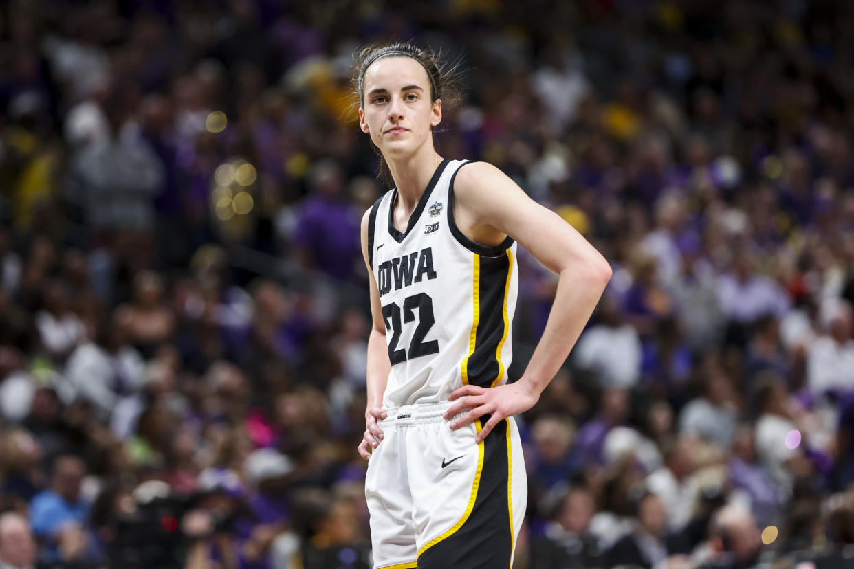 Apr 2, 2023; Dallas, TX, USA; Iowa Hawkeyes guard Caitlin Clark (22) stands on the court during a stop in play against the LSU Lady Tigers in the first half during the final round of the Women's Final Four NCAA tournament at the American Airlines Center. Mandatory Credit: Kevin Jairaj-USA TODAY Sports