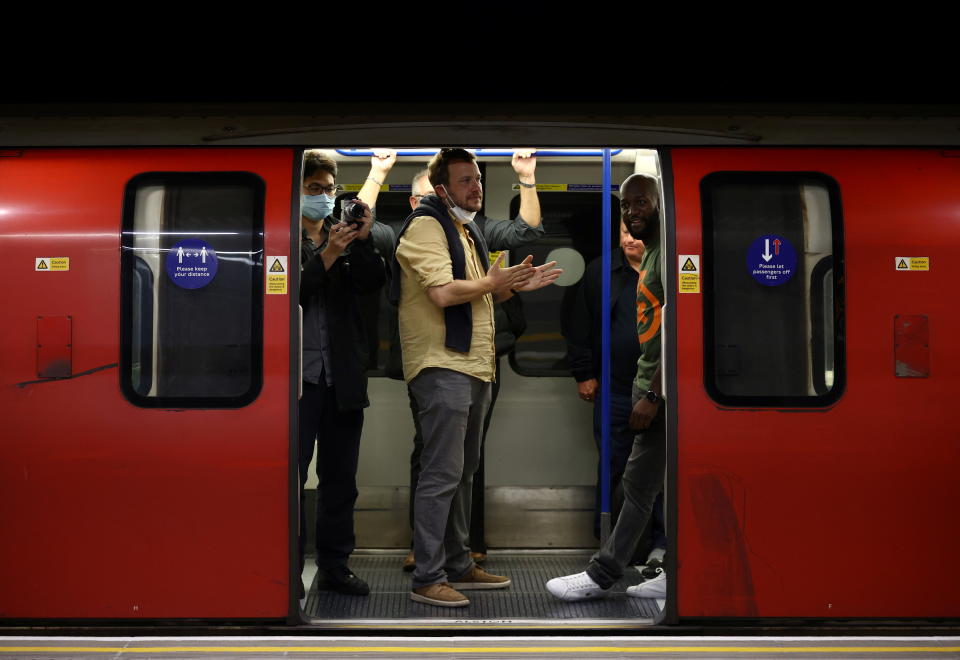 London Tube Passengers travel on a Northern Line tube train at the newly opened Battersea Power Station underground station in Battersea, London, Britain, September 20, 2021. REUTERS/Hannah McKay