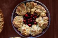 <p>This dessert is two in one: cobbler and pie at the same time! Which means it's twice as good, especially if you're sharing it with your guests at Christmas time. </p><p><strong><a href="https://www.countryliving.com/food-drinks/recipes/a36549/cranberry-cherry-cobbler-pie/" rel="nofollow noopener" target="_blank" data-ylk="slk:Get the recipe for Cranberry-Cherry Cobbler Pie;elm:context_link;itc:0;sec:content-canvas" class="link ">Get the recipe for Cranberry-Cherry Cobbler Pie</a>.</strong></p>