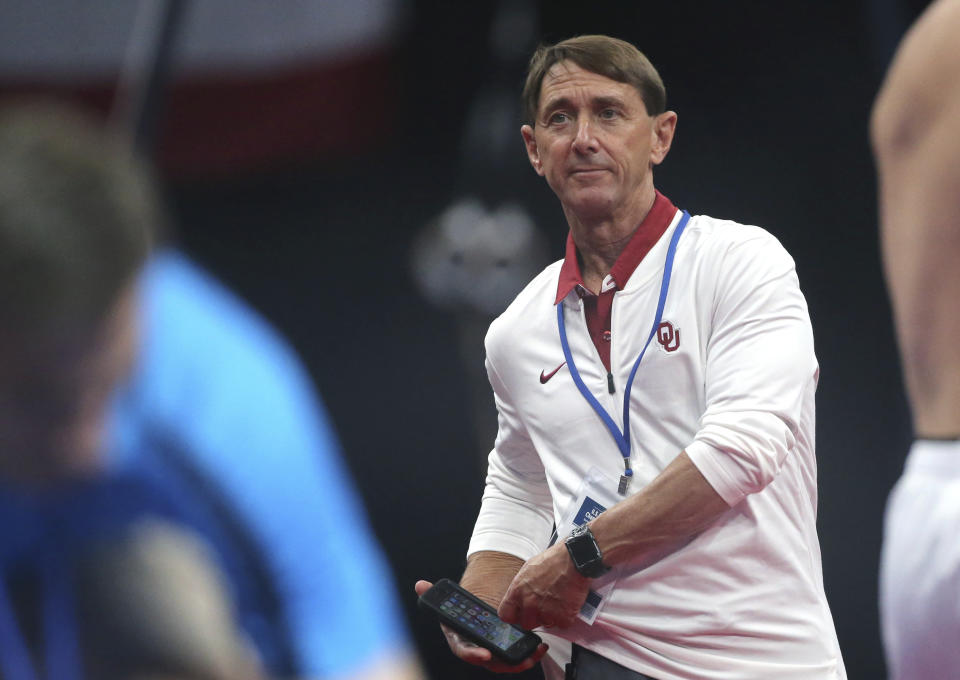 USA Gymnastics coach Mark Williams watches during a training session at the U.S. Gymnastics Championships, Wednesday, Aug. 15, 2018, in Boston. The president is new. The board of directors is new. The leadership at the Olympic level is new. And yet USA Gymnastics is still searching for its footing nearly two years after the initial fallout from the sexual abuse scandal surrounding former national team doctor Larry Nassar began, with everyone from the athletes to club owners wondering when one of the US Olympic movement's marquee programs is going to truly start moving forward. (AP Photo/Elise Amendola)