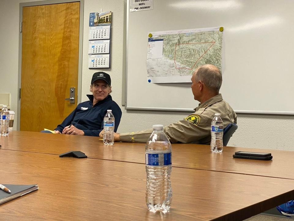 California Gov .Gavin Newsom, left, with San Bernardino County Sheriff Shannon Dicus. On Sunday, the governor visited the county's Emergency Operations Center  to meet with county officials to assess the impact of Tropical Storm Hilary.