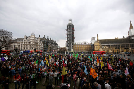 Climate change activists from the Extinction Rebellion protest at the Parliament Square in London, Britain May 1, 2019. REUTERS/Henry Nicholls