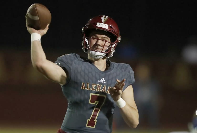 MISSION HILLS, CALIF. - SEP. 27, 2019. Bishop Alemany quarterback Miller Moss throws downfield againt Bishop Amat in the first quarter at Alemany High on Friday night, Oct. 4, 2019. (Luis Sinco/Los Angeles Times)