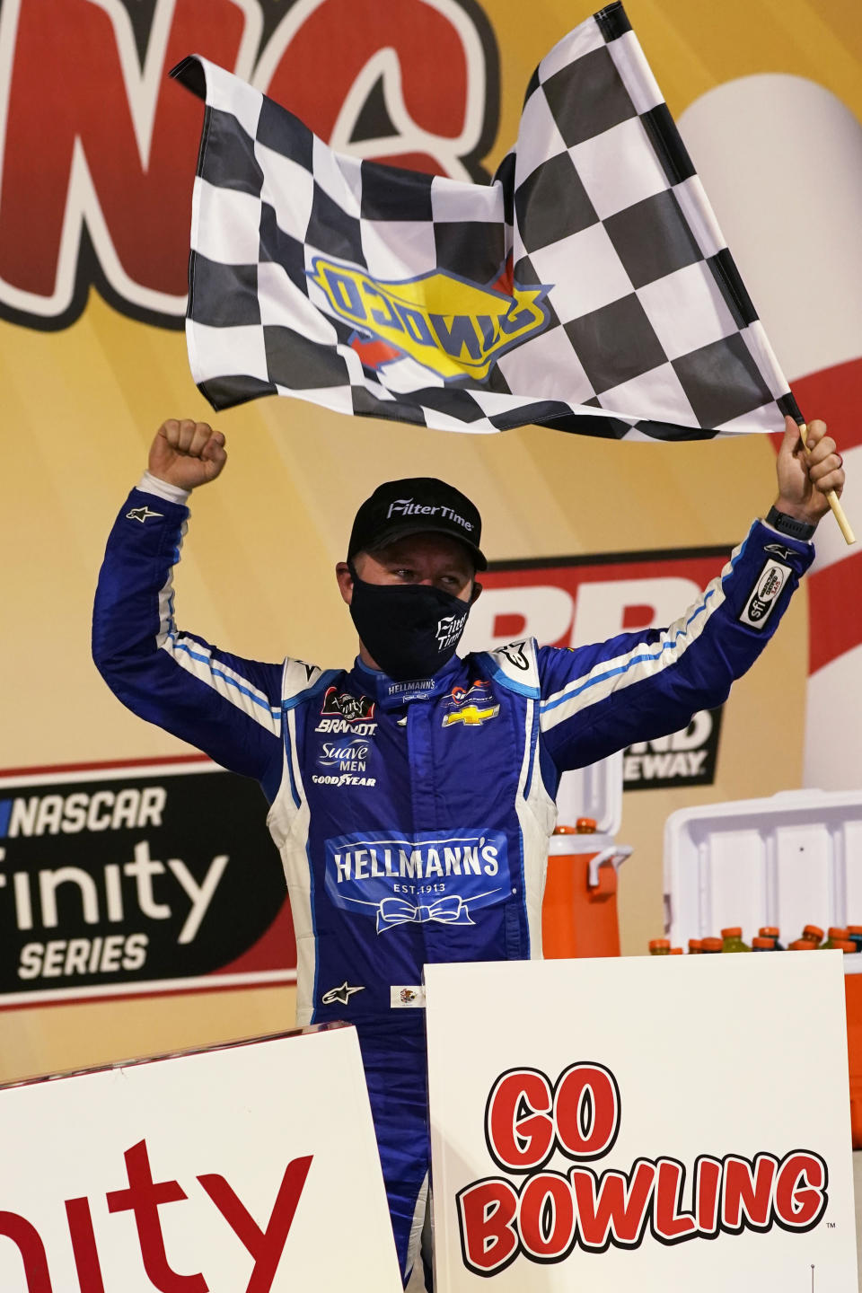 Justin Allgaier celebrates in Victory Lane after winning a NASCAR Xfinity Series auto race Friday, Sept. 11, 2020, in Richmond, Va. (AP Photo/Steve Helber)