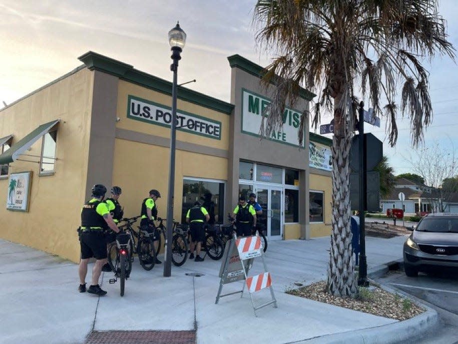 Breakfast? Law enforcement officers assigned to outside the federal courthouse in Fort Pierce during the Trump hearing, gear up for the day.