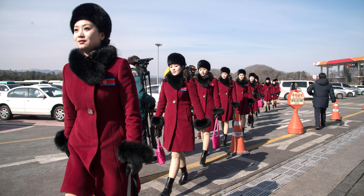 North Korean cheerleaders on their way to the 2018 PyeongChang Winter Olympic Games. (Photo: Ed Jones/AFP/Getty Images)