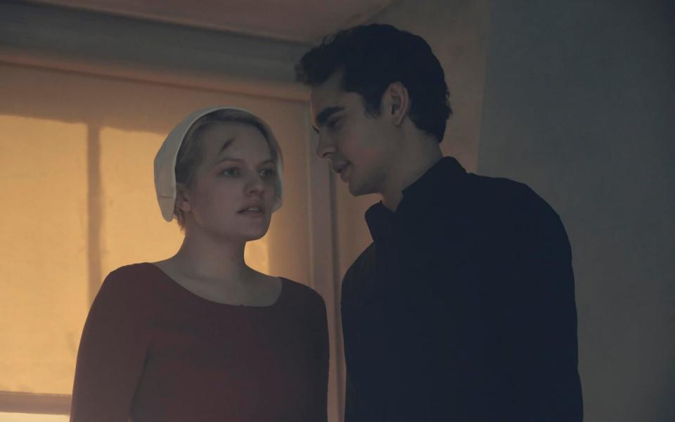Offred (Elisabeth Moss) and Nick (Max Minghella)