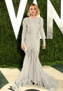 Also photographed entering the Vanity Fair fete was former Disney darling, Miley Cyrus, who channeled Old Hollywood in a glamorous Roberto Cavalli gown, chandelier earrings, ruby-red lips, and a classic coif.<br><br><a href="http://bit.ly/lifeontheMlist" rel="nofollow noopener" target="_blank" data-ylk="slk:Follow Matt Whitfield on Twitter!;elm:context_link;itc:0;sec:content-canvas" class="link ">Follow Matt Whitfield on Twitter!</a>