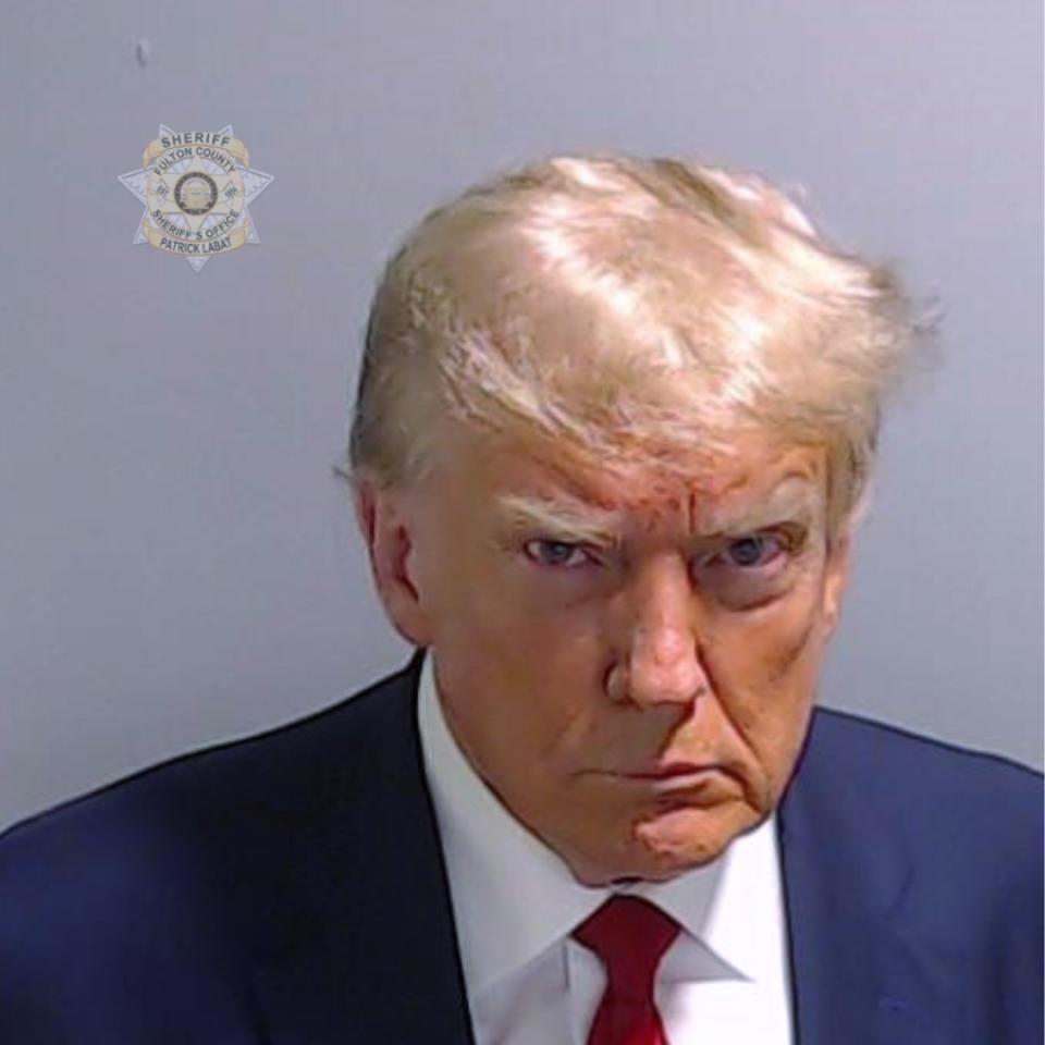 This booking photo provided by the Fulton County Sheriff’s Office shows former President Donald Trump on Thursday, Aug. 24, 2023, after he surrendered and was booked at the Fulton County Jail in Atlanta. Trump is accused by Fulton County District Attorney Fani Willis of attempting to subvert the will of Georgia voters in a bid to keep Joe Biden out of the White House. (Fulton County Sheriff’s Office via AP)