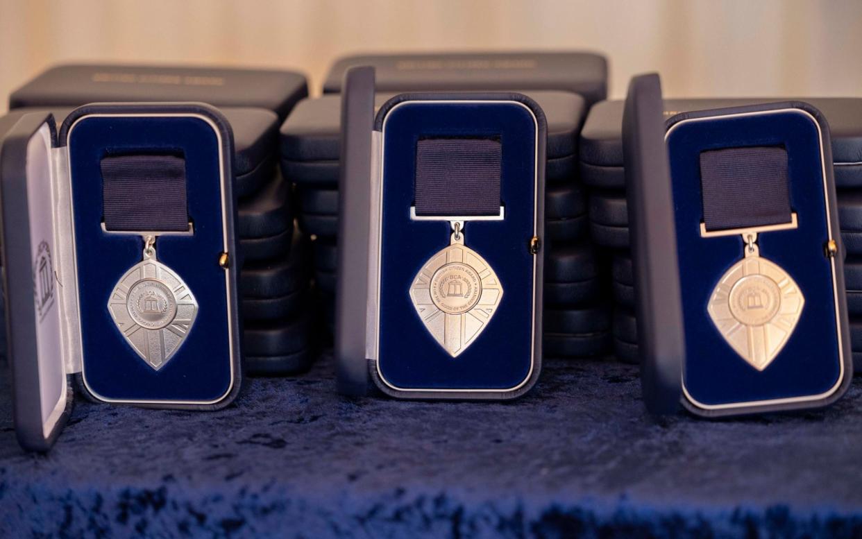 British Citizen Award medals on display at the ceremony in London