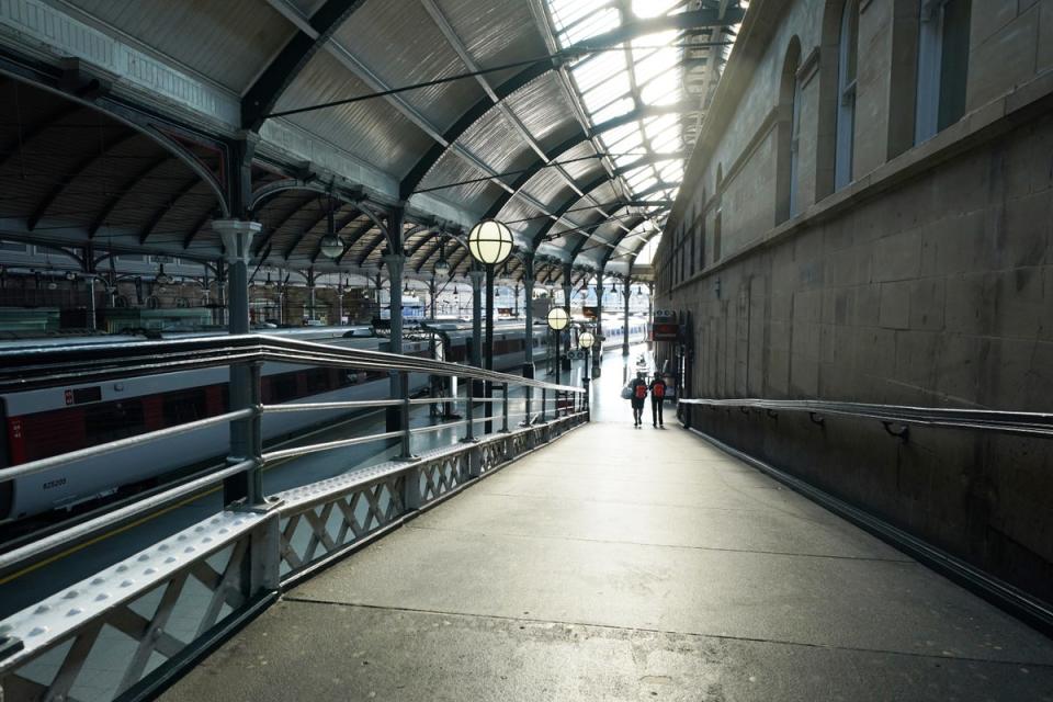 Passengers at a quiet Newcastle station (Owen Humphreys/PA) (PA Wire)