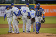 Kansas City Royals team members leave starting pitcher Danny Duffy (30) on the mound during the fifth inning of a baseball game against the Detroit Tigers, Wednesday, May 12, 2021, in Detroit. (AP Photo/Carlos Osorio)