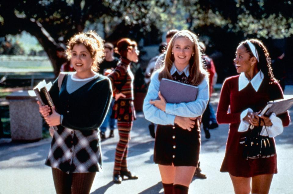 Tye, Cher, and Dionne walking through the school