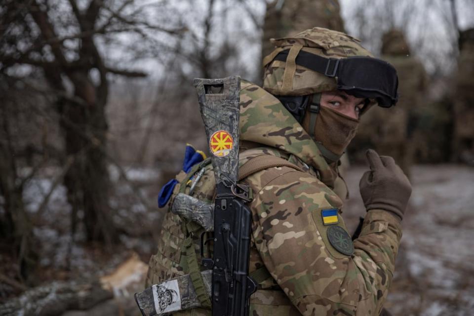 <div class="inline-image__caption"><p>A member of the 3rd Separate Assault Brigade (Azov Unit) of the Armed Forces of Ukraine prepares to fire 152 mm howitzer 2A65 Msta-B, amid Russia's attack on Ukraine, near Bahmut, in Donetsk region, Ukraine, February 6, 2023. </p></div> <div class="inline-image__credit">REUTERS/Marko Djurica</div>