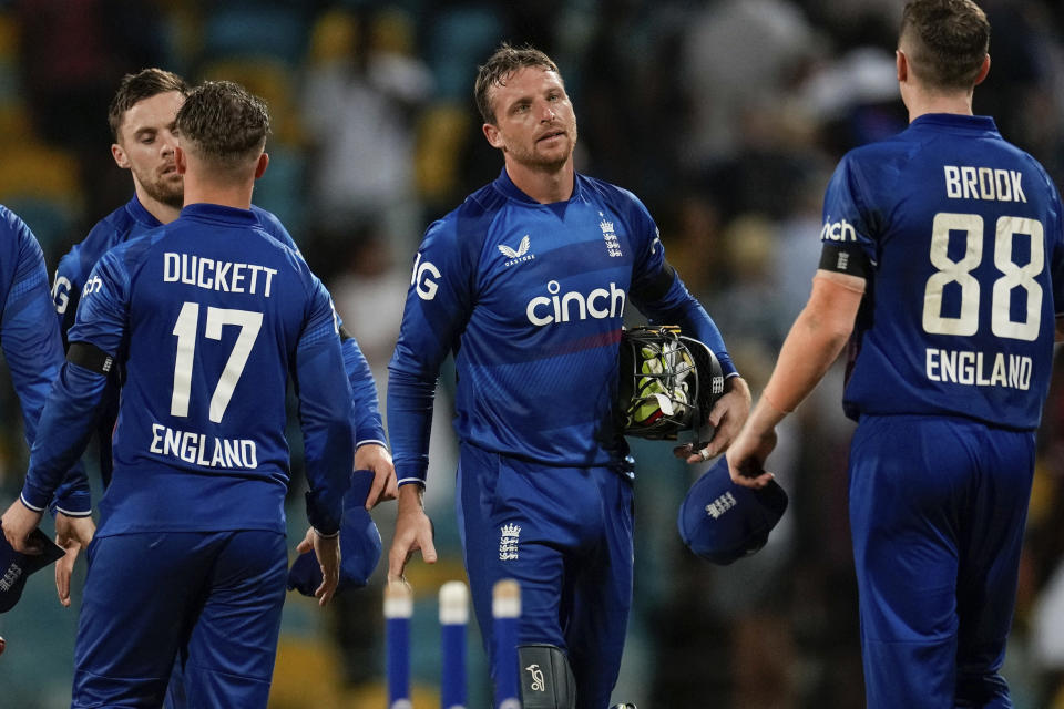 England's captain Jos Buttler walks off the field at the end of his side's lost against West Indies in the third ODI cricket match at Kensington Oval in Bridgetown, Barbados, Saturday, Dec. 9, 2023. (AP Photo/Ricardo Mazalan)