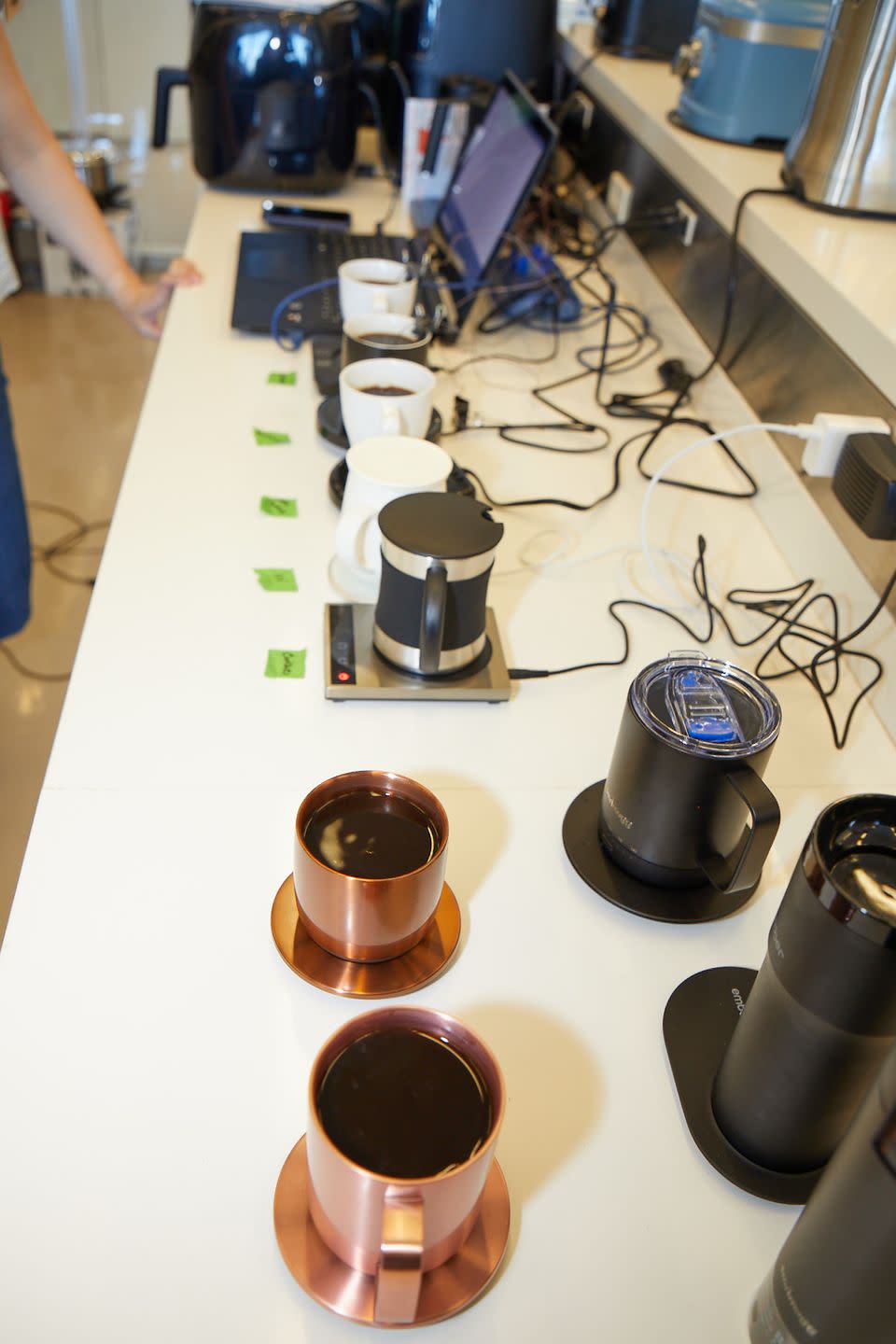a shot of three ember mugs during heated mug testing in the lab