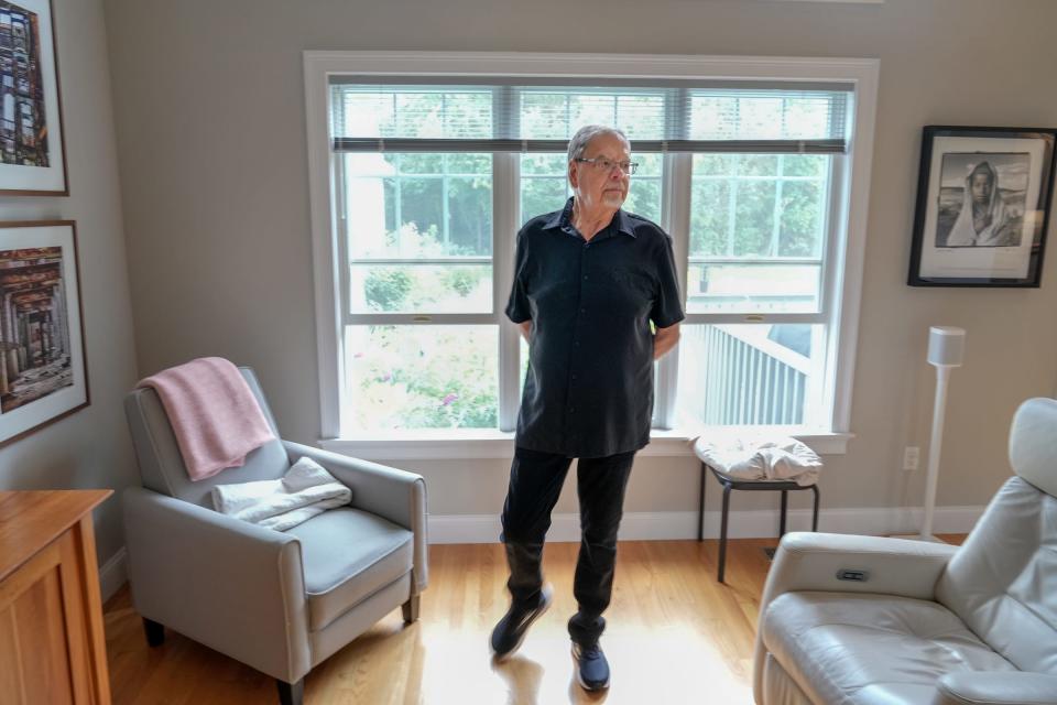 Photographer Keith Jochim,  in his Warwick home. Jochim, who was diagnosed with early-stage Alzheimer's disease, has an upcoming photo show curated with his wife, Linda Golob.