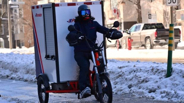 Some major logistics companies, including Purolator, are testing new delivery models, including electric cargo bikes.