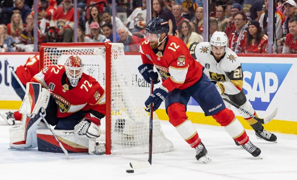 Florida Panthers center Eric Staal (12) skates with the puck as Vegas Golden Knights center Brett Howden (21) chases behind in the second period of Game 3 of the NHL Stanley Cup Final at the FLA Live Arena on Thursday, June 8, 2023, in Sunrise, Fla.