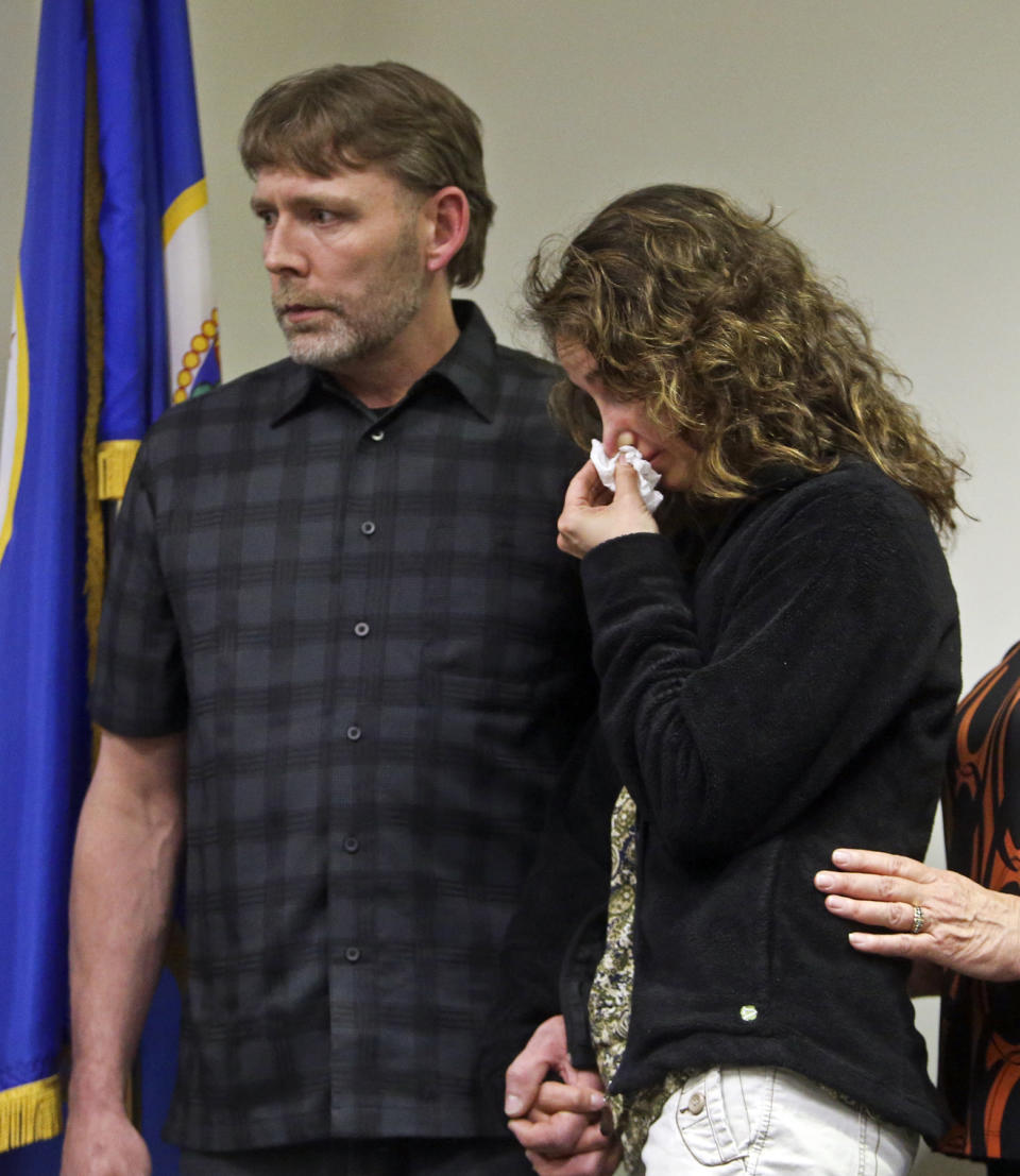 CORRECTS SPELLING TO HAILE - Jay and Jenny Kifer, right, the parents of Haile Kifer who was murdered, react during a news conference, Tuesday, April 29, 2014, after the homeowner Byron Smith was sentenced in Little Falls, Minn. Smith, who shot and killed Nick Brady, 17, and Haile, 18, during a 2012 Thanksgiving Day break-in, was convicted of premeditated murder. The jury took only about three hours to soundly reject his claim of self-defense. Smith was immediately sentenced to life without parole. (AP Photo/The Star Tribune, David Joles) MANDATORY CREDIT; ST. PAUL PIONEER PRESS OUT; MAGS OUT; TWIN CITIES TV OUT.