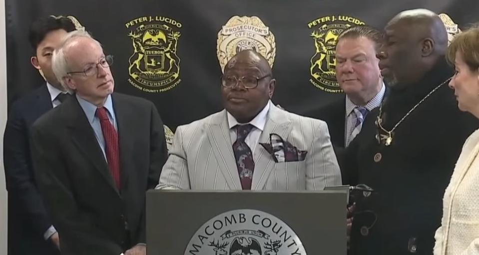 Mack Howell at a podium during his press conference following his exoneration
