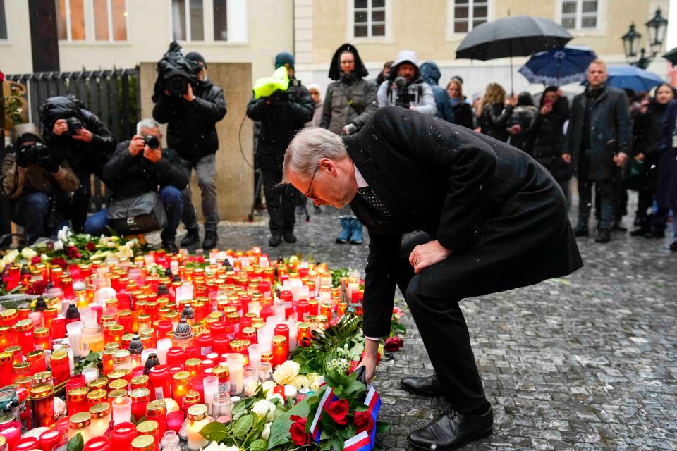 Czech Republic’s prime minister Petr Fiala was among those to lay flowers this morning (AP)