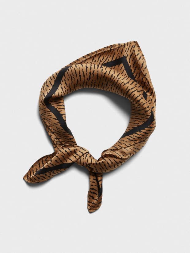<p>Banana Republic Tiger Square Scarf, $25, <a href="https://rstyle.me/+PDsxXsU6UurLZ9qpZNqjww" rel="nofollow noopener" target="_blank" data-ylk="slk:available here;elm:context_link;itc:0;sec:content-canvas" class="link ">available here</a>.</p>