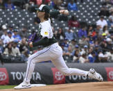 Colorado Rockies starting pitcher Ryan Feltner throws in the first inning of a baseball game against the Texas Rangers, Saturday, May 11, 2024, in Denver. (AP Photo/Jerilee Bennett)