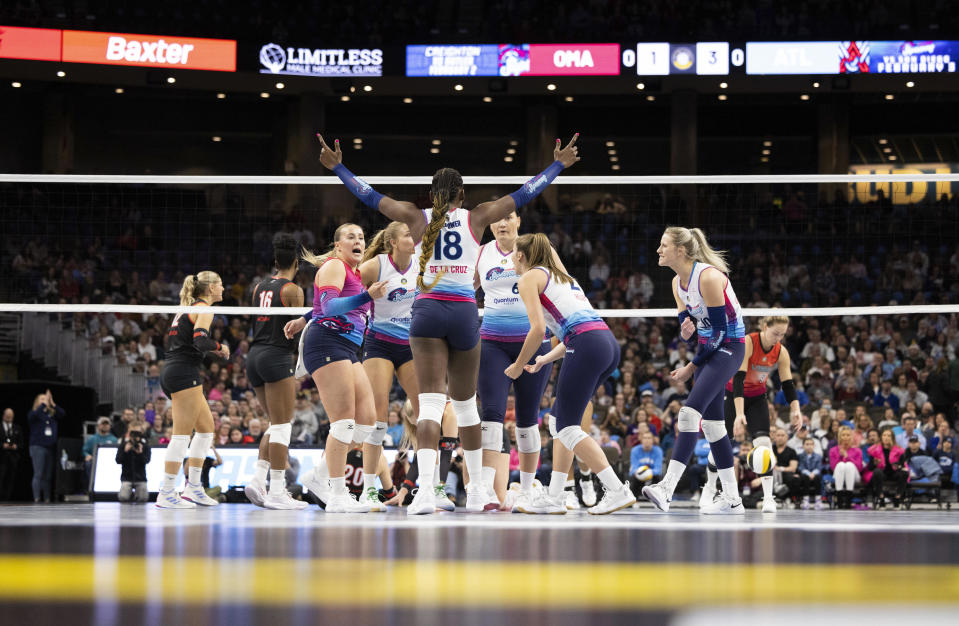 From left, Omaha Supernovas' Bethania De La Cruz and teammates celebrate a point against the Atlanta Vibe during a Pro Volleyball Federation game Wednesday, Jan. 24, 2024, in Omaha, Neb. (AP Photo/Rebecca S. Gratz)